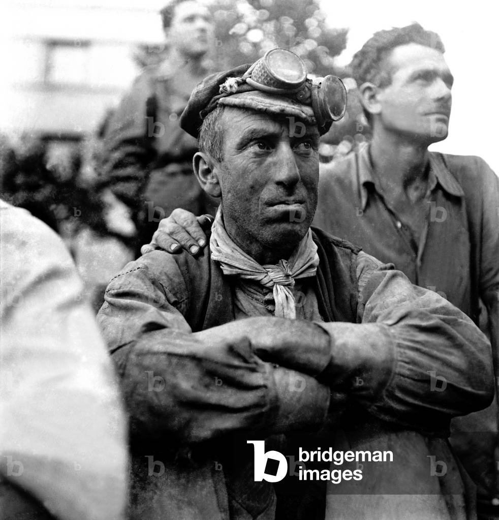 Falk factory worker at a meeting of Luigi Longo of the Italian Communist Party, Milan, 1945 (b/w photo)