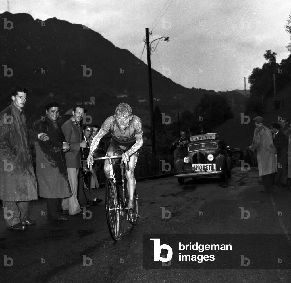 Grand Prix of Lugano (1953) Cyclist Jacques Anquetil (who will win the race) followed by his team (b/w photo)