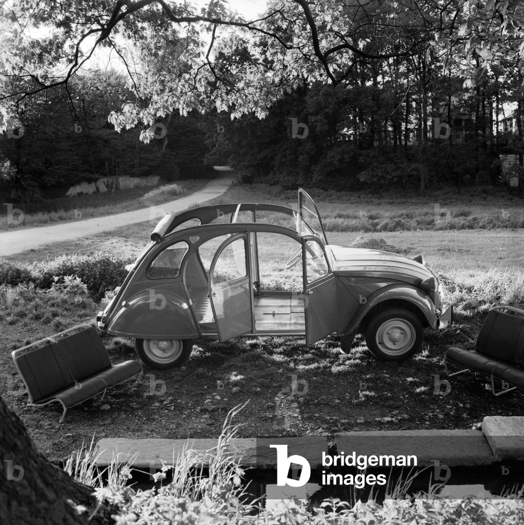 A family Travelling in their Citroen 2CV, Monza, 1967 (b/w photo)