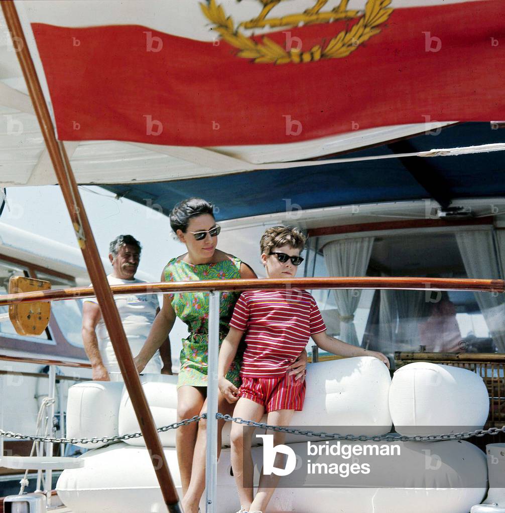 Princess Margaret, her son Viscount Lynley and Karim Aga Khan on a yacht, Porto Cervo, Sardinia, 1960s (photo)