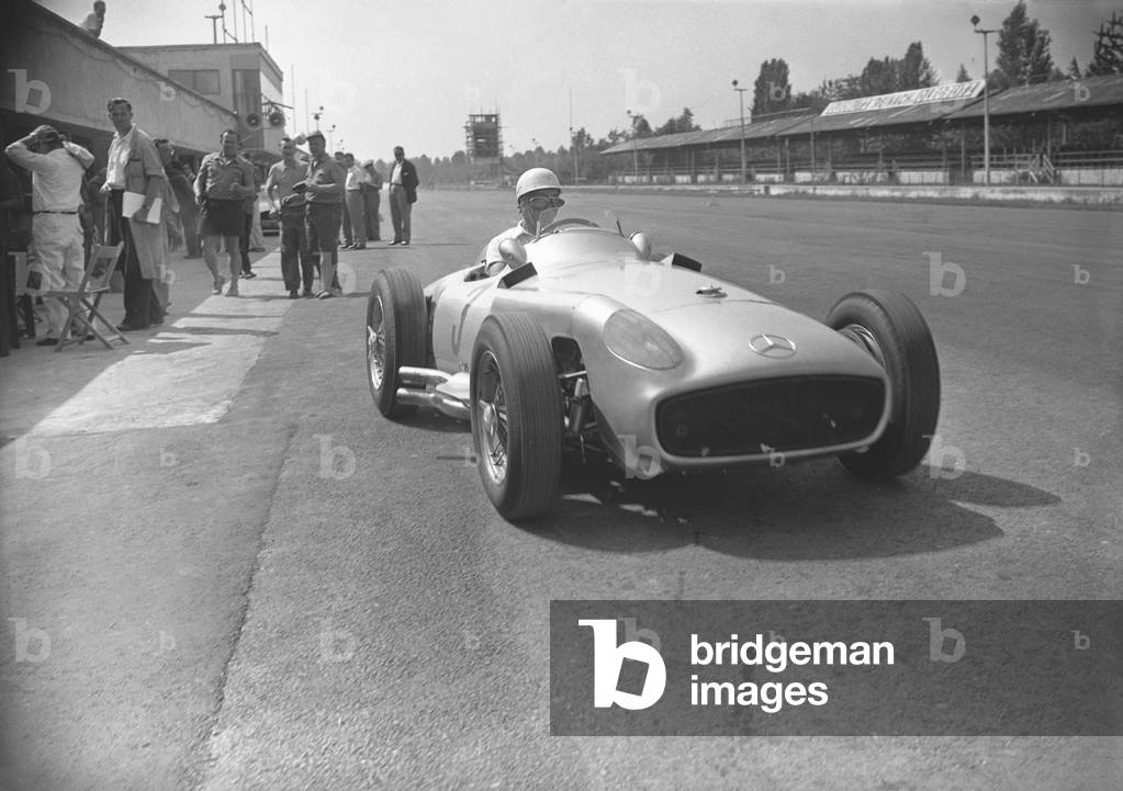 Juan Manuel Fangio at the Monza Grand Prix, 1955 (b/w photo)
