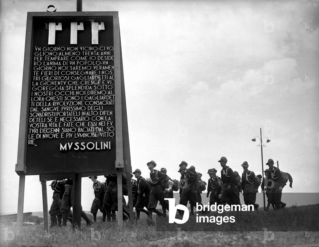 Fascist Youth (Balilla) returning from a training march, Rome, 1934 (b/w photo)