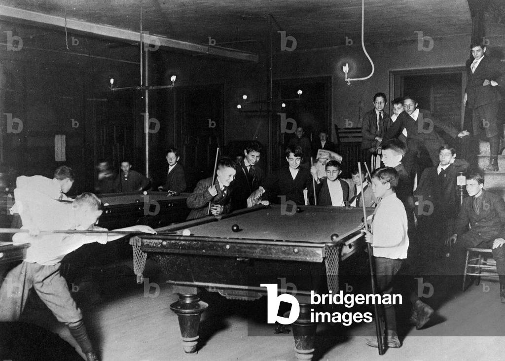 A billiard room for young people from immigrant families, St Louis, 1910 (b/w photo)