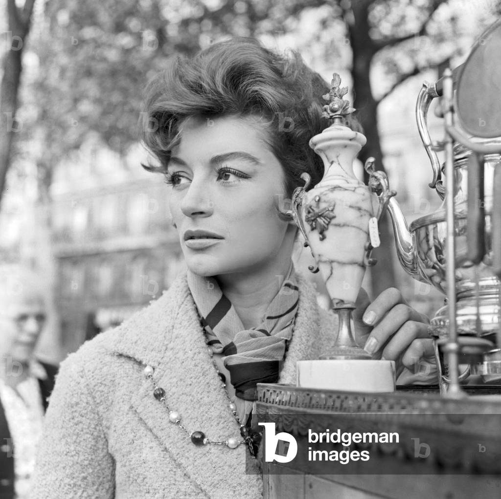 Anouk Aimee at the flea market in Paris, 1959 (b/w photo)