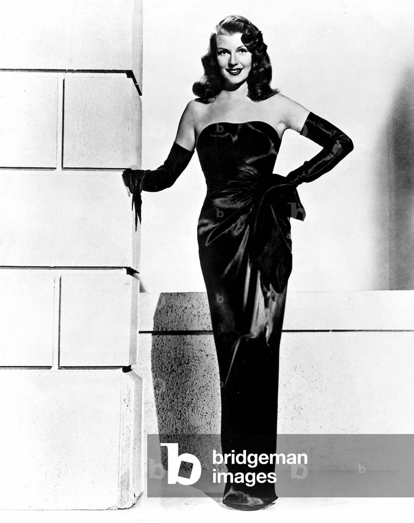 Rita Hayworth wearing the dress from the film 