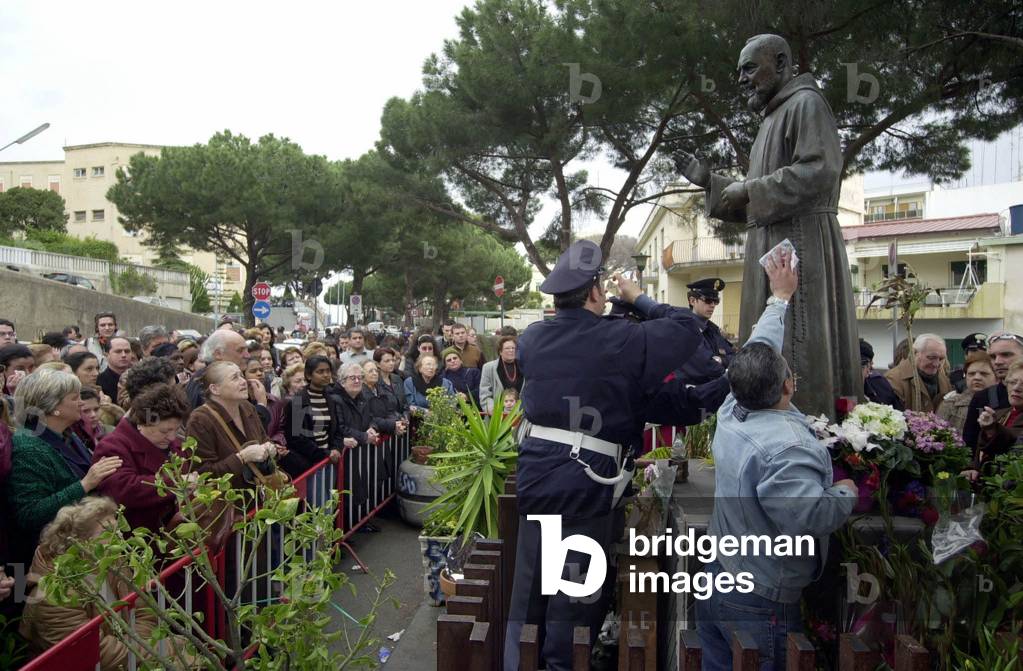 The statue of Padre Pio weeps tears of blood, Messina, Sicily, 2002 (photo)