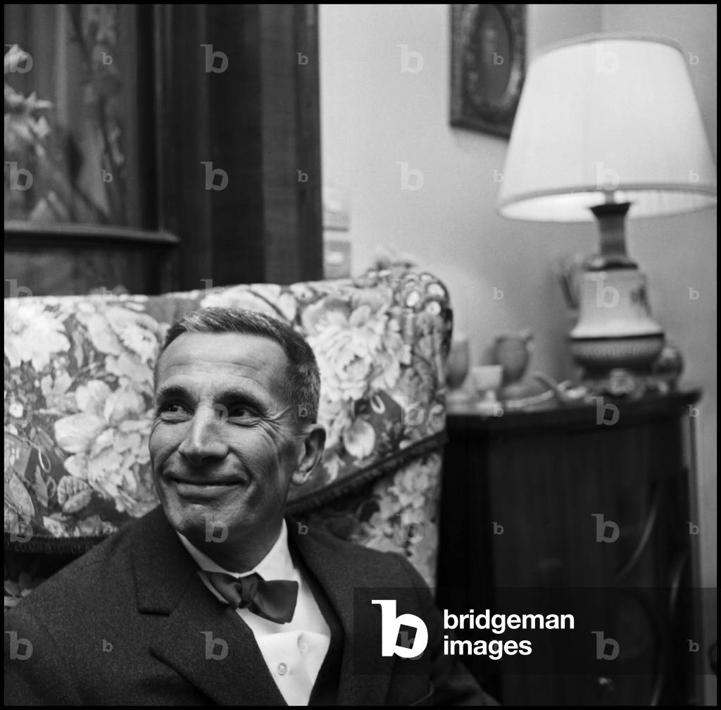 Dino Buzzati at the party at Mondadori publisher, Milan, 1958 (b/w photo)