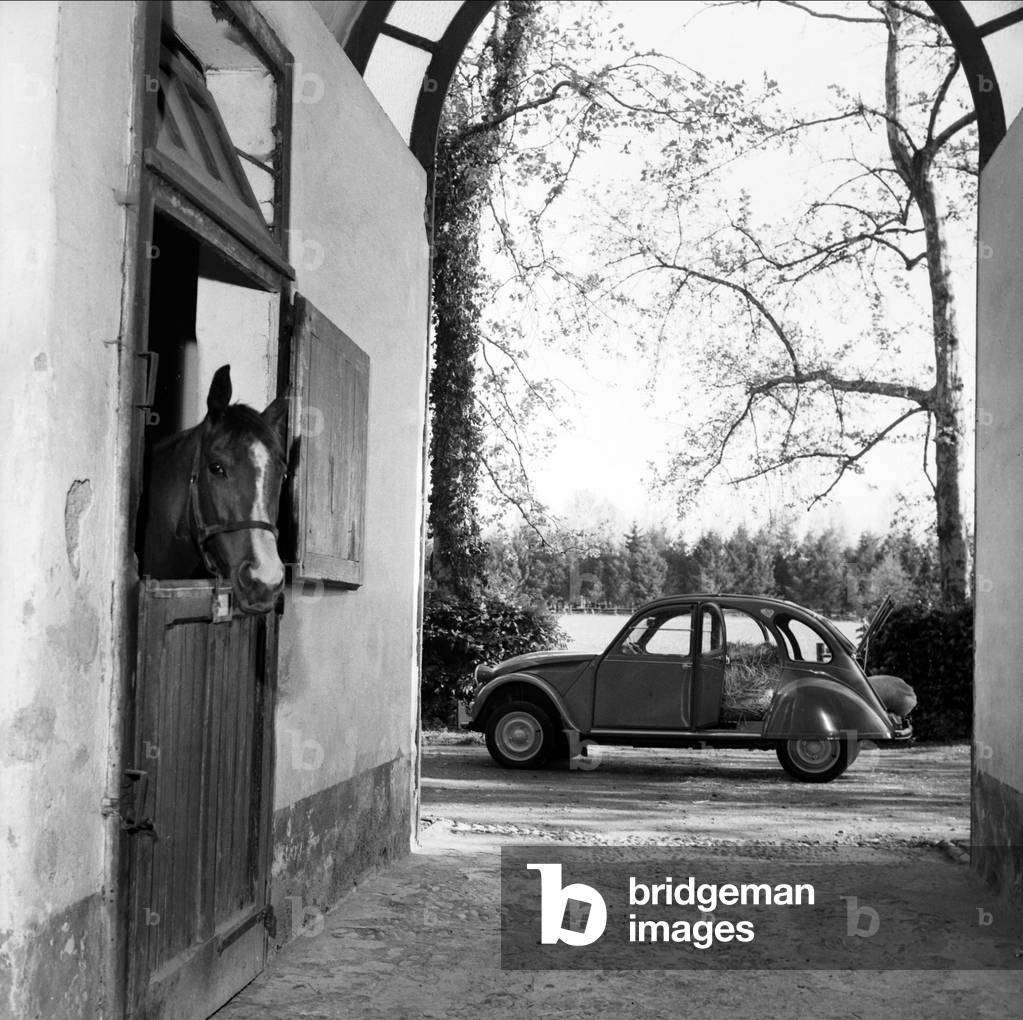 A family Travelling in their Citroen 2CV, Monza, 1967 (b/w photo)