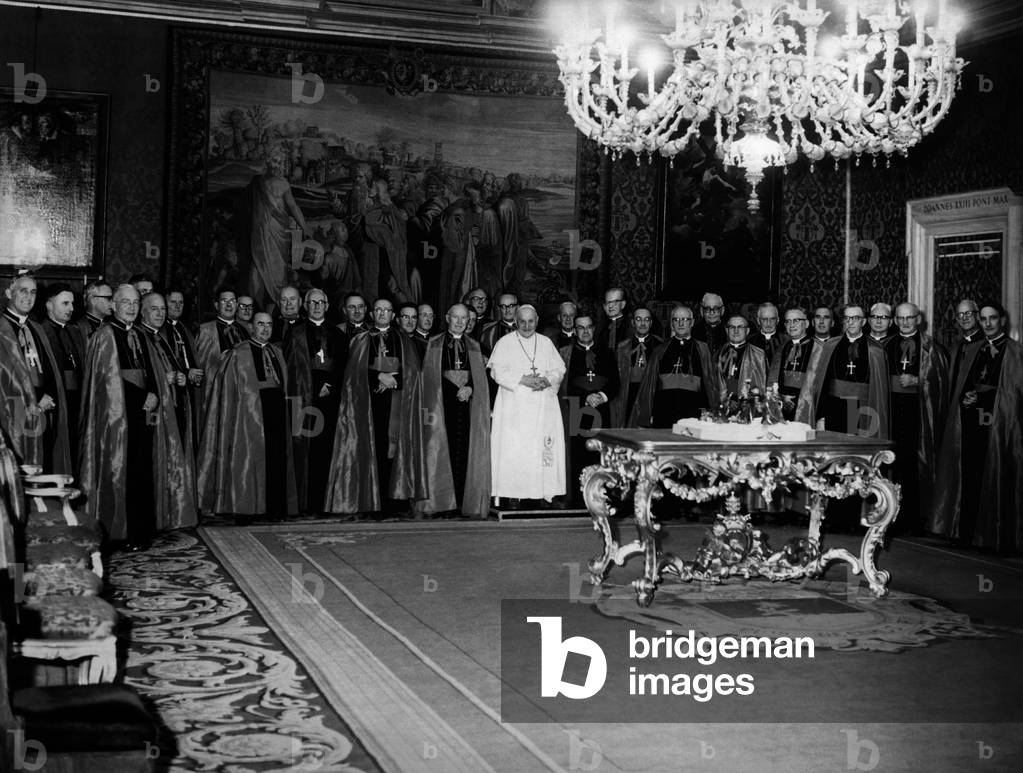 Pope John XXIII with the bishops of the Australian and New Zealand delegation at the ecumenical council of Vatican II, 1962 (b/w photo)