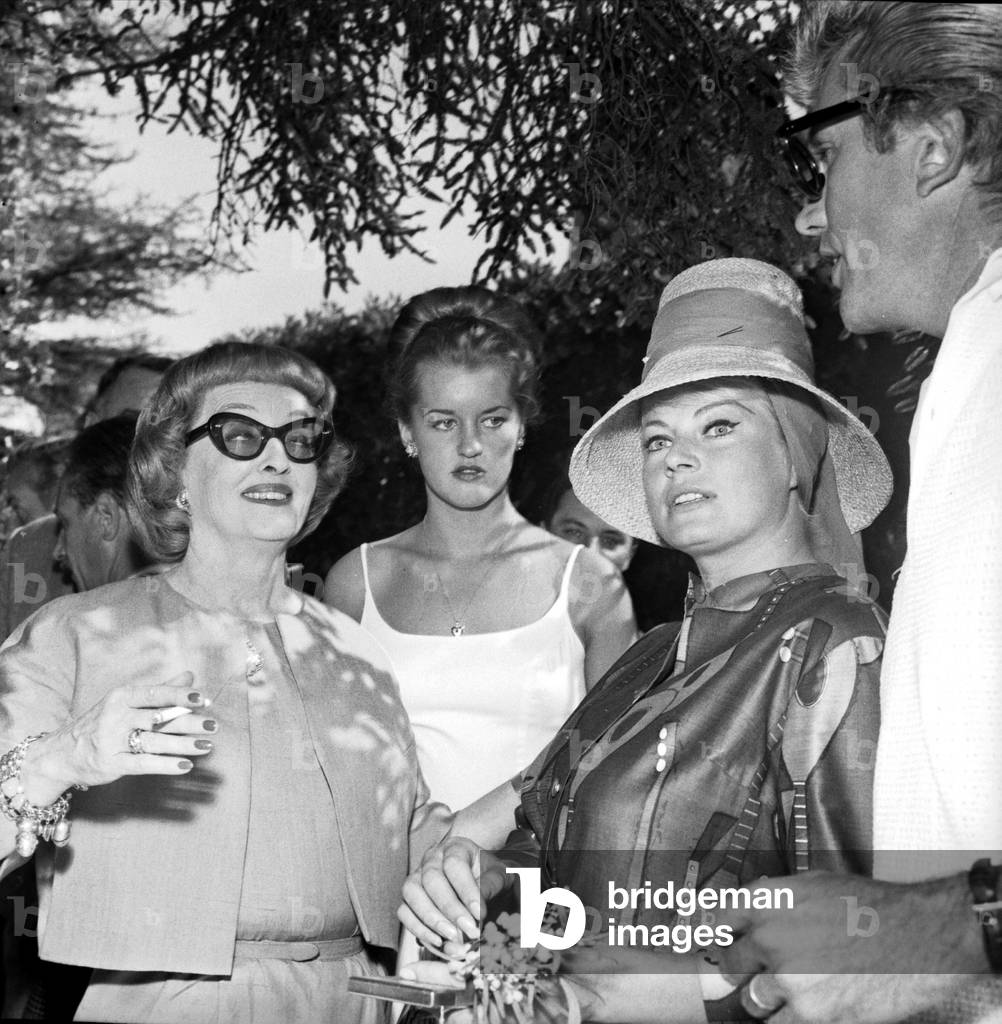 Bette Davis, her daughter Barbara, Anita Ekberg and Rik Van Nutter at the 16th edition of the Cannes Film Festival, 1963 (b/w photo)