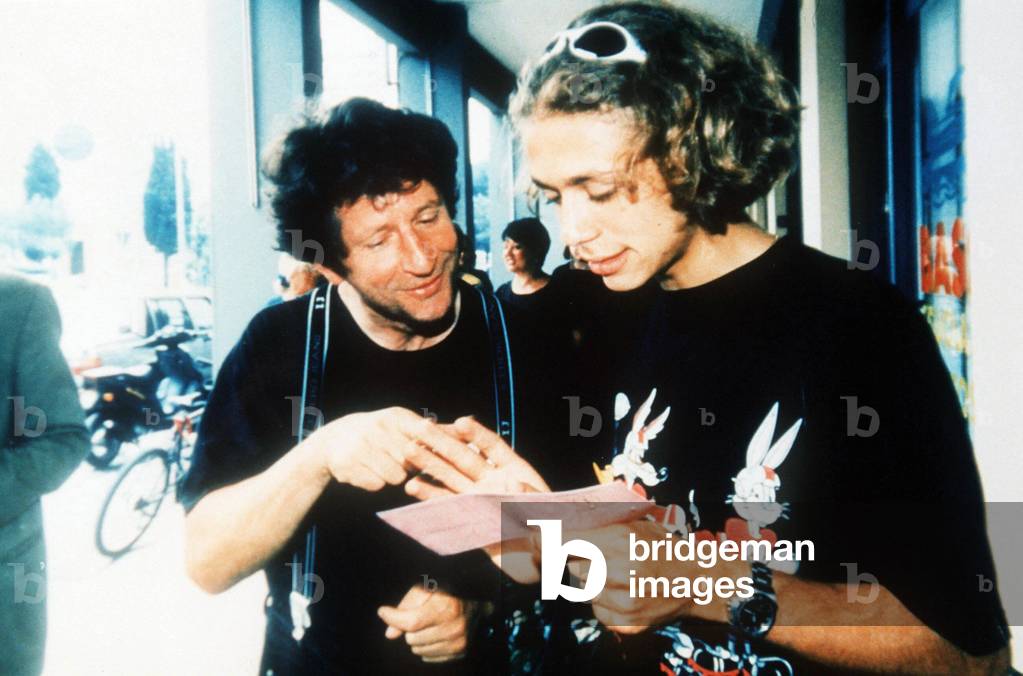 Valentino Rossi holding his driving licence with his father Graziano Rossi, Pesaro, 1997 (photo)