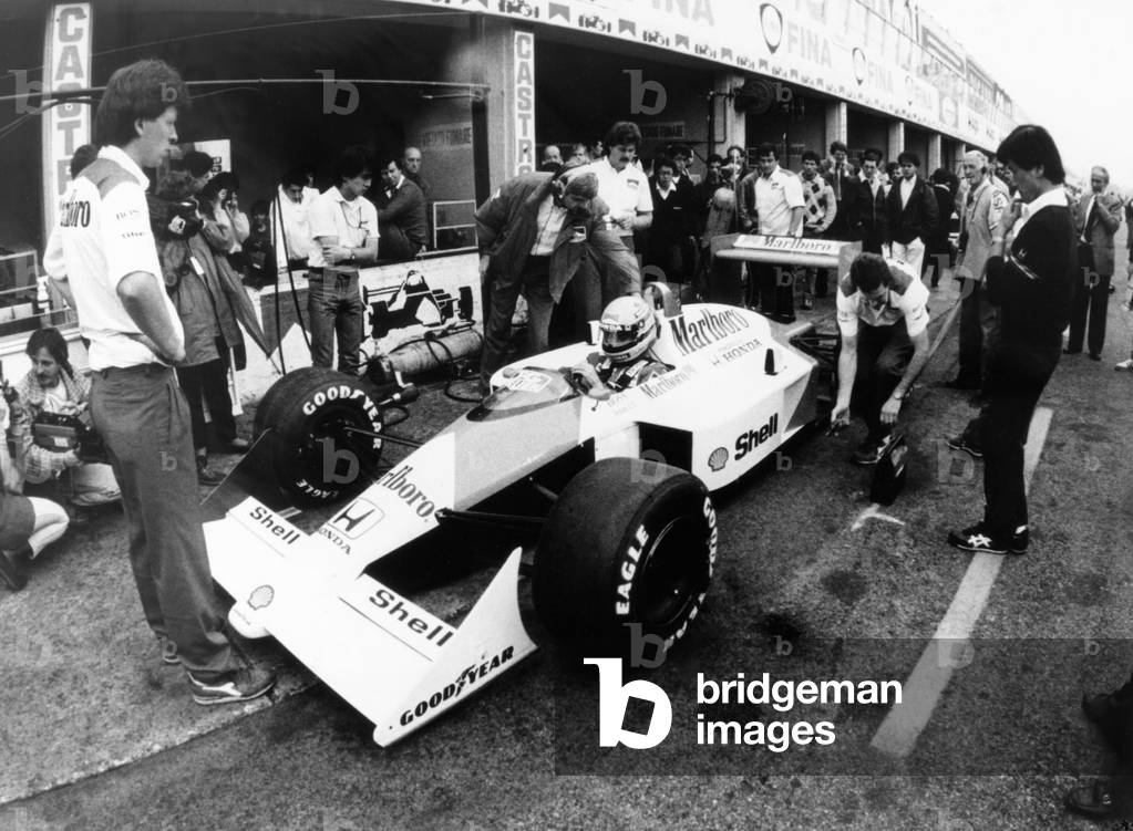 Ayrton Senna in his car, 1989 (b/w photo)