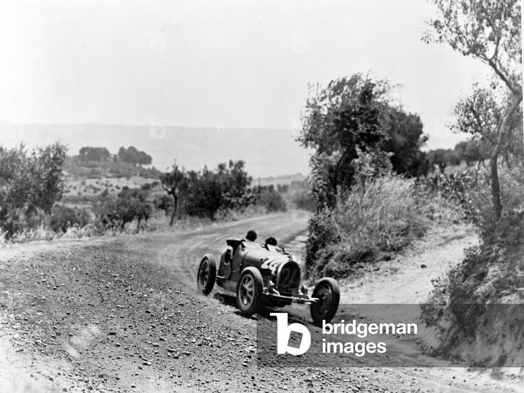 Tazio Nuvolari on a Bugatti car at the Acerbo Cup (b/w photo)