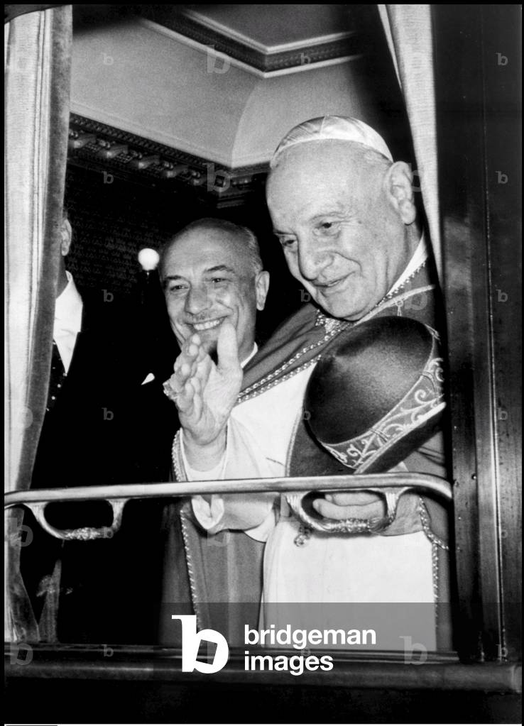 Pope John XXIII before leaving with the Prime Minister Amintore Fanfani to visit Loreto and Assisi, Rome, 1962 (b/w photo)