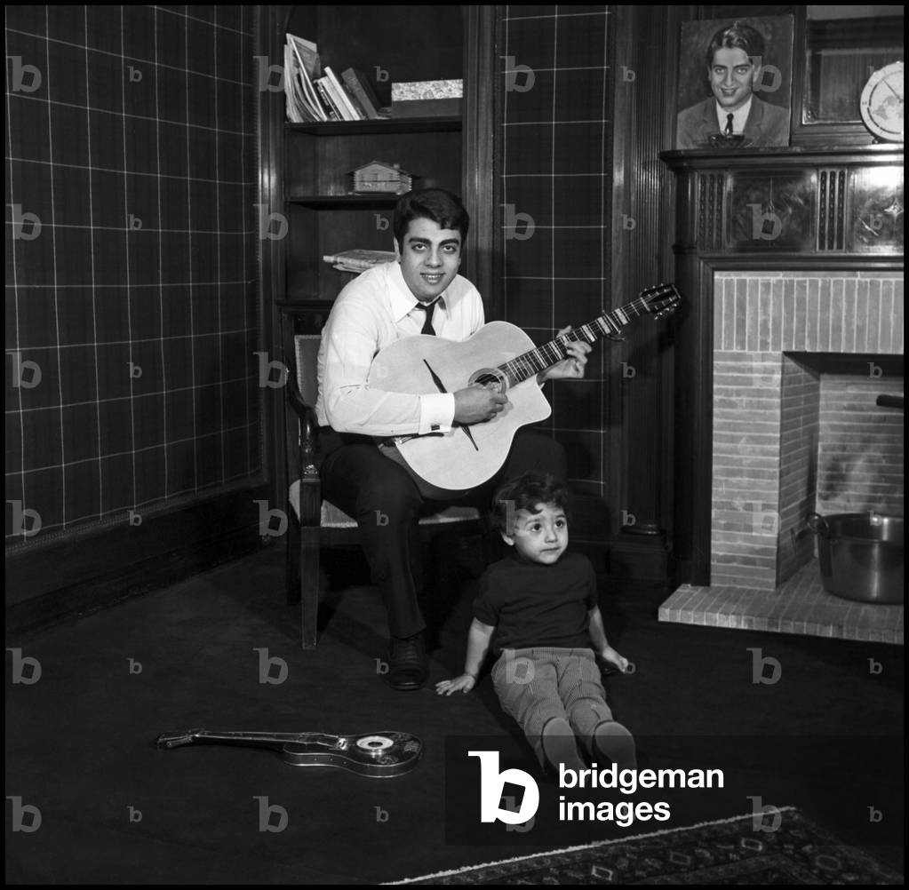 Enrico Macias at home with his daughter Jocya, Paris, 1966 (b/w photo)