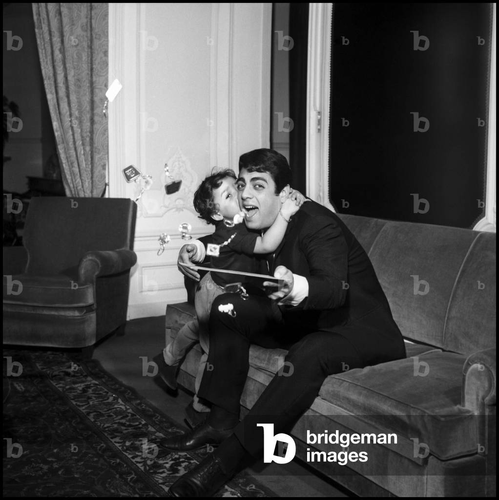 Enrico Macias at home with his daughter Jocya, Paris, 1966 (b/w photo)