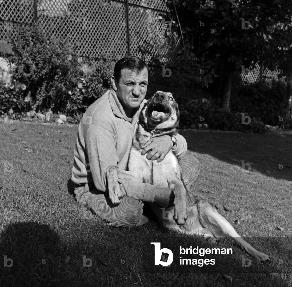 Lino Ventura at home, Saint-Cloud, 1961 (b/w photo)
