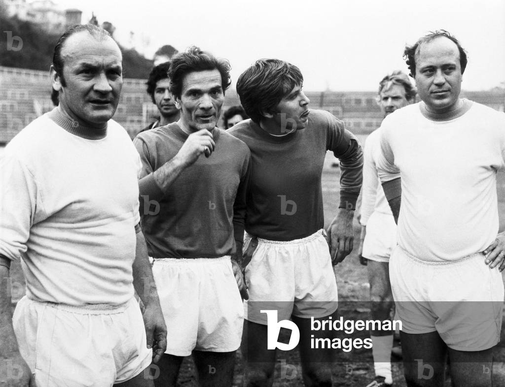Giacomo Losi, Paolo Carosi, Pier Paolo Pasolini and Gianni Morandi at a friendly match, Rome, 1971 (b/w photo)