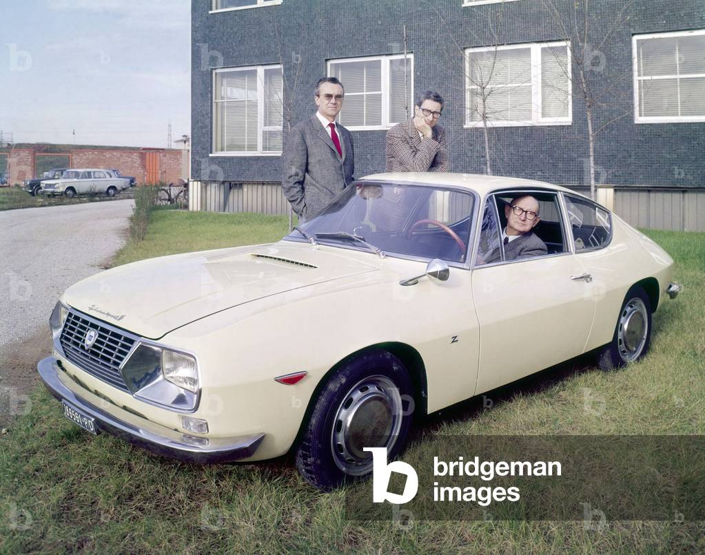 Elio, Gianni and their father Ugo Zagato, founder of the company, in a Lancia Fulvia Zagato, Milan, 1960s (photo)