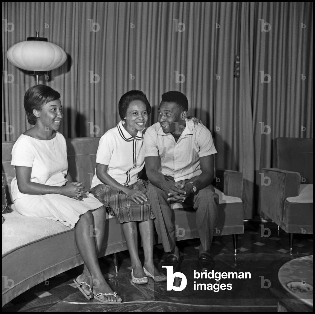 Pelé at home with his mother and his sister, Santos, Brazil, 1964 (b/w photo)