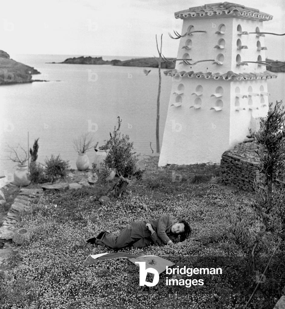 Salvador Dali in his garden, Port Lligat, Spain, 1957 (b/w photo)
