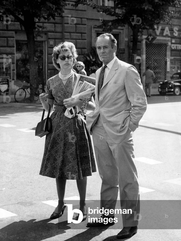 Henry Fonda with his wife Afdera Franchetti in a street, Rome, 1959 (b/w photo)
