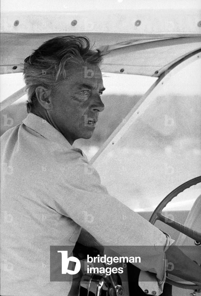 Herbert von Karajan on his motorboat on holiday on the Côte d'Azur, Saint Tropez, 1967 (b/w photo)