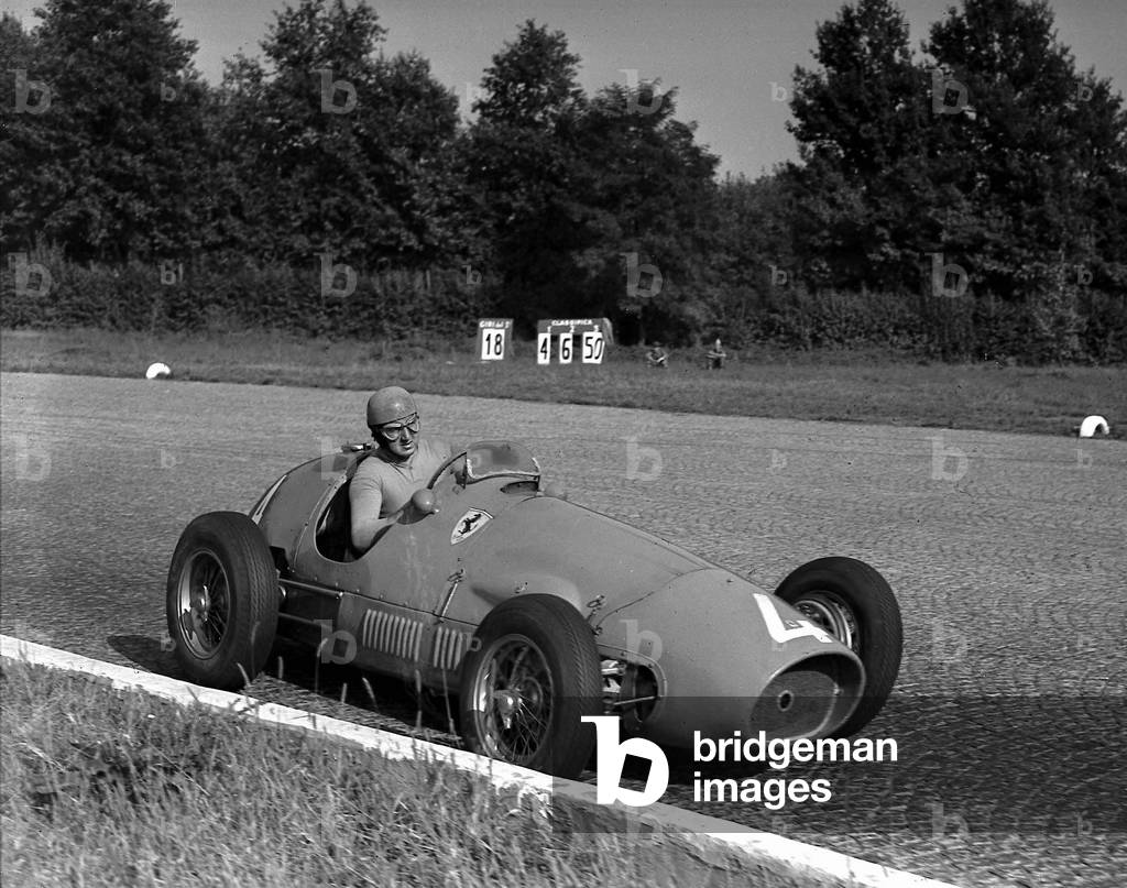 Alberto Ascari on Ferrari at the Formula 1 Grand Prix in Monza, Italy, 1953 (b/w photo)