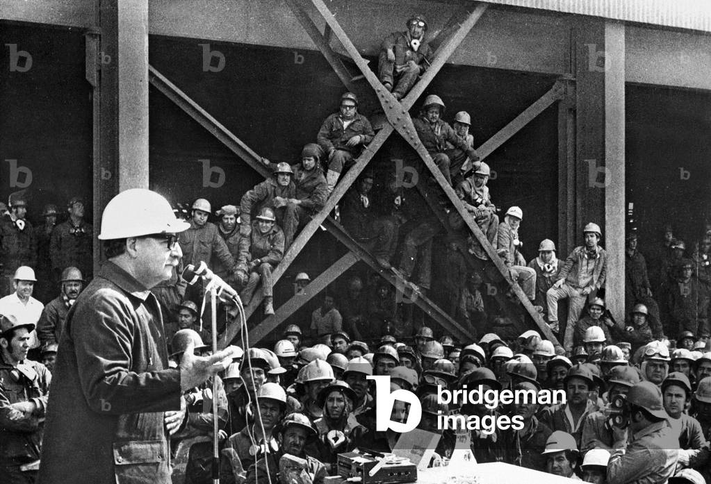 Salvador Allende speaking to a crowd of workers in a factory, Santiago del Chile, Chili, 1973 (b/w photo)
