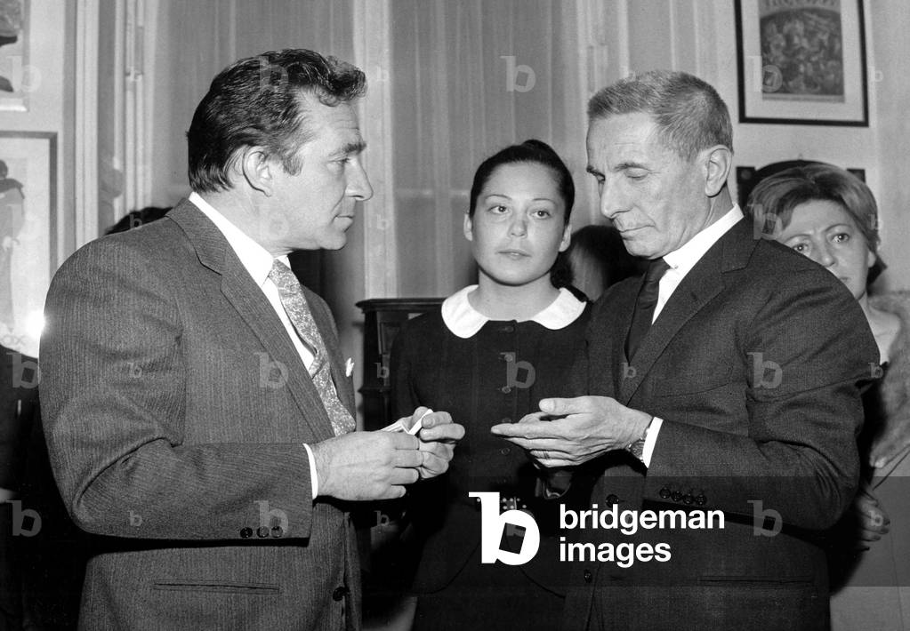 Ugo Tognazzi and Dino Buzzati at press conference of film “Il Fischio al naso”, Milan, 1967 (b/w photo)