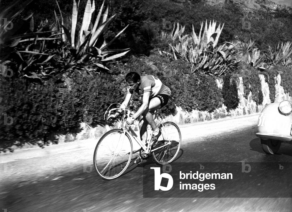 Fausto Coppi at the Milan-Sanremo race, 1949 (b/w photo)