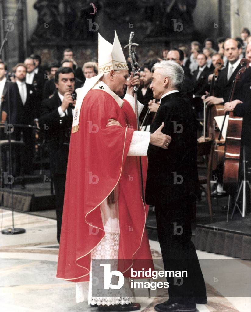 Pope John Paul II congratulates the conductor Herbert von Karajan, 1985 (photo)