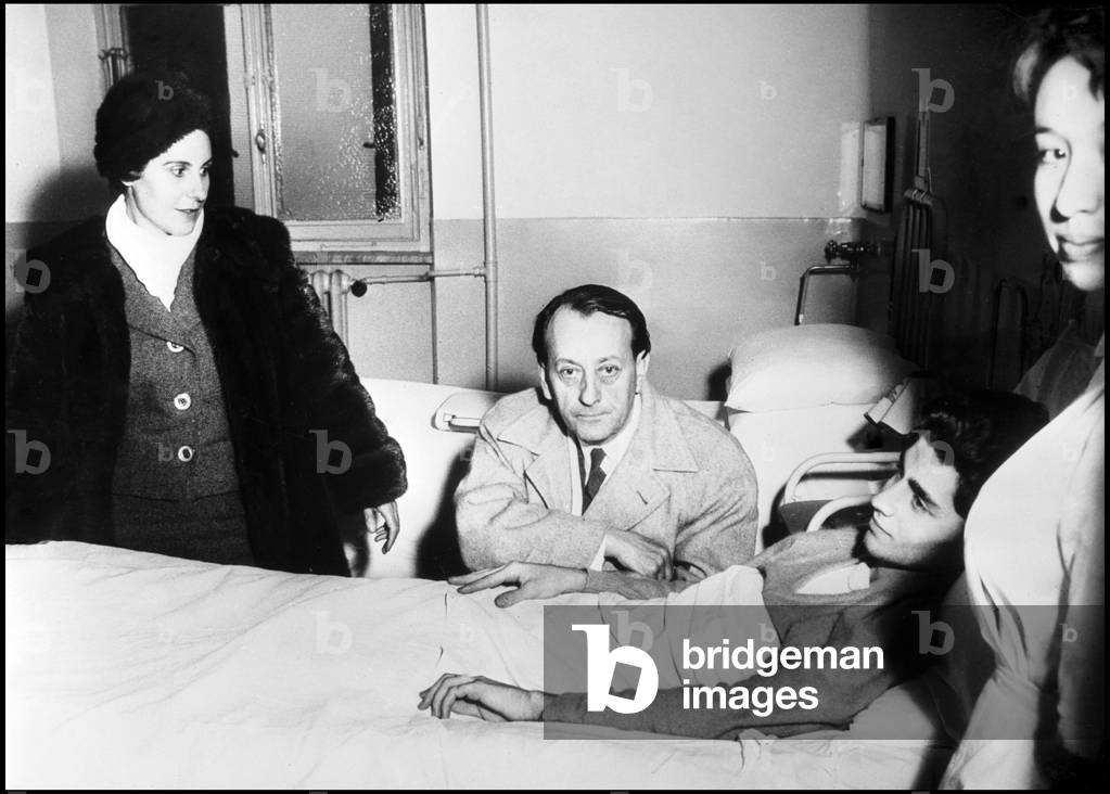 Andre Malraux and Marie Madeleine Lioux visiting their son Pierre Gauthier in the Ospedale Maggiore, Turin, 1959 (b/w photo)