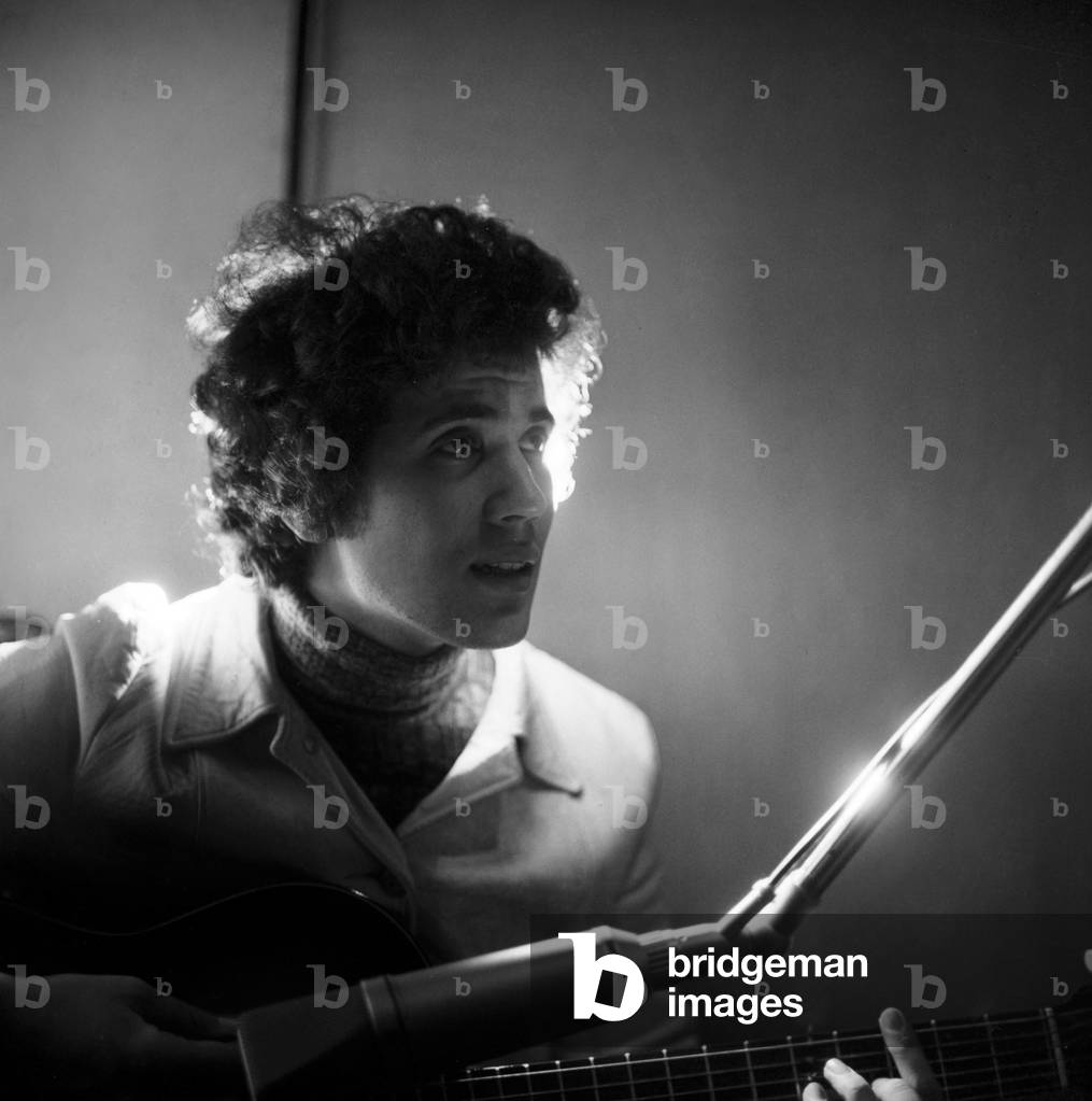 Lucio Battisti in a recording studio in Milan, Italy, 1968 (b/w photo)