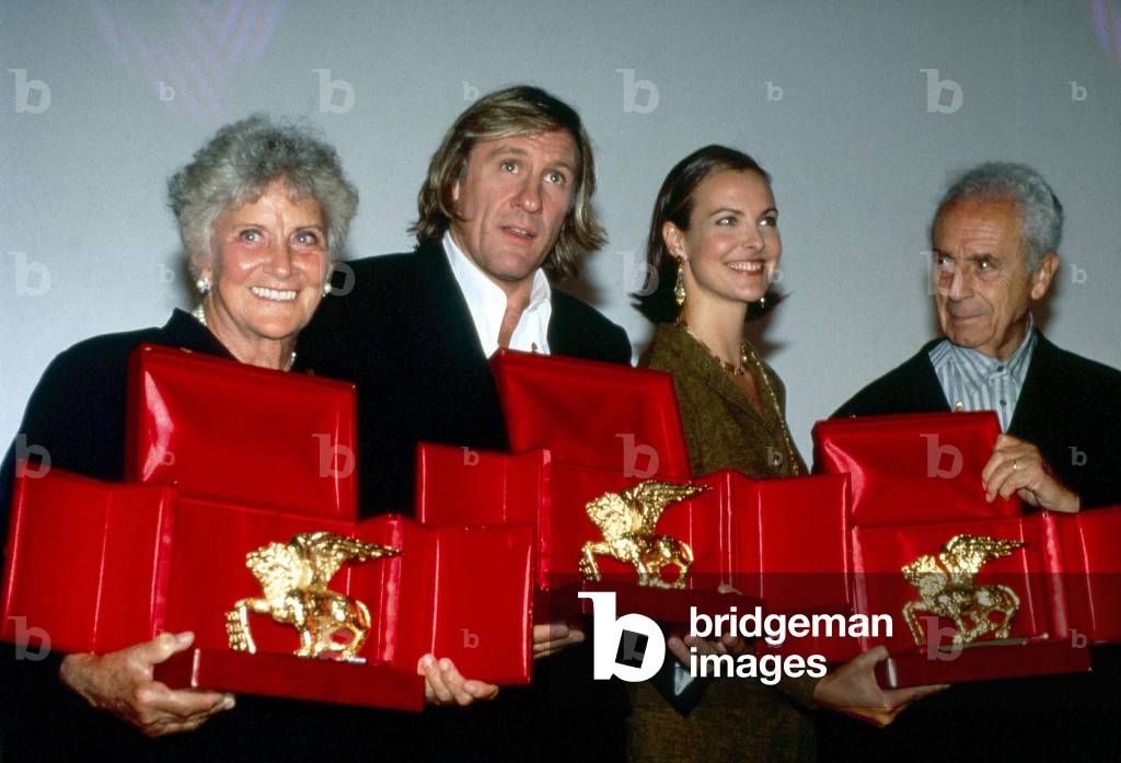 Alida Valli, Gerard Depardieu, Carole Bouquet and Michelangelo Antonioni receive the Golden Lion at the 54th Venice International Film Festival, 1997 (photo)