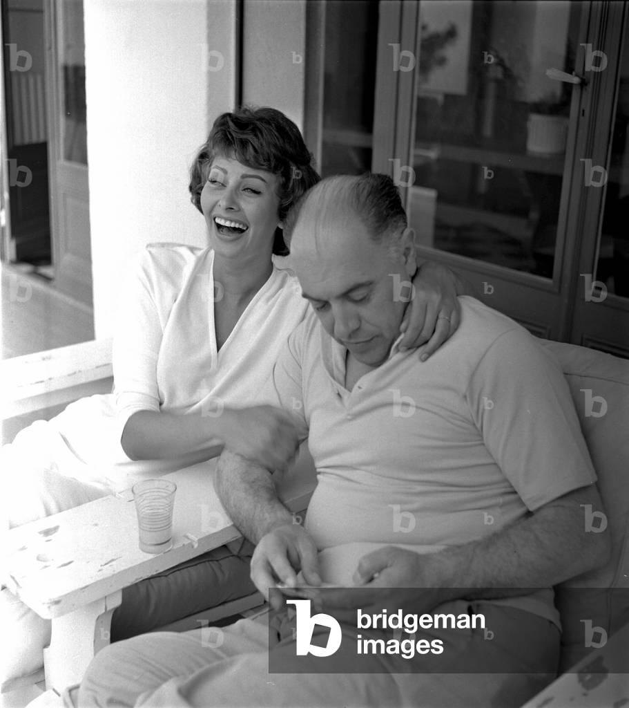 Sophia Loren and her husband Carlo Ponti on holiday in Saint Tropez, France, 1958 (b/w photo)