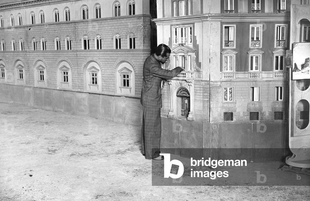 Construction of cardboard sets for the shooting of a film in the Cinecitta studios, Rome, 1937 (b/w photo)