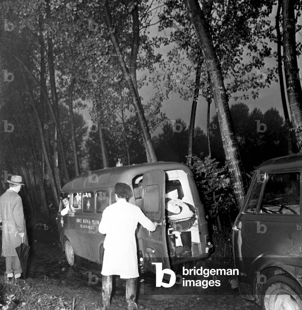 Ambulance at the site of the plane crash that killed Enrico Mattei, Bescape, 1962 (b/w photo)