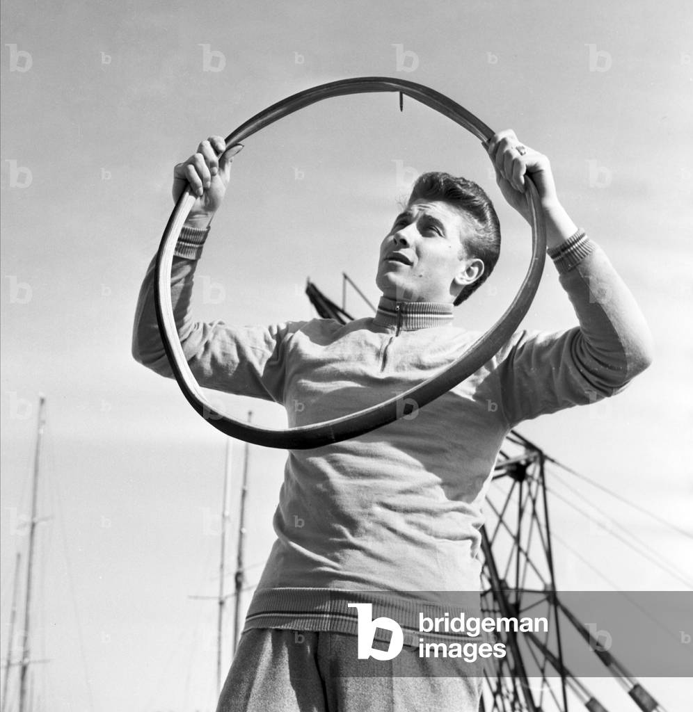 Cyclist Jacques Anquetil in the dock in Cannes (1957) (b/w photo)