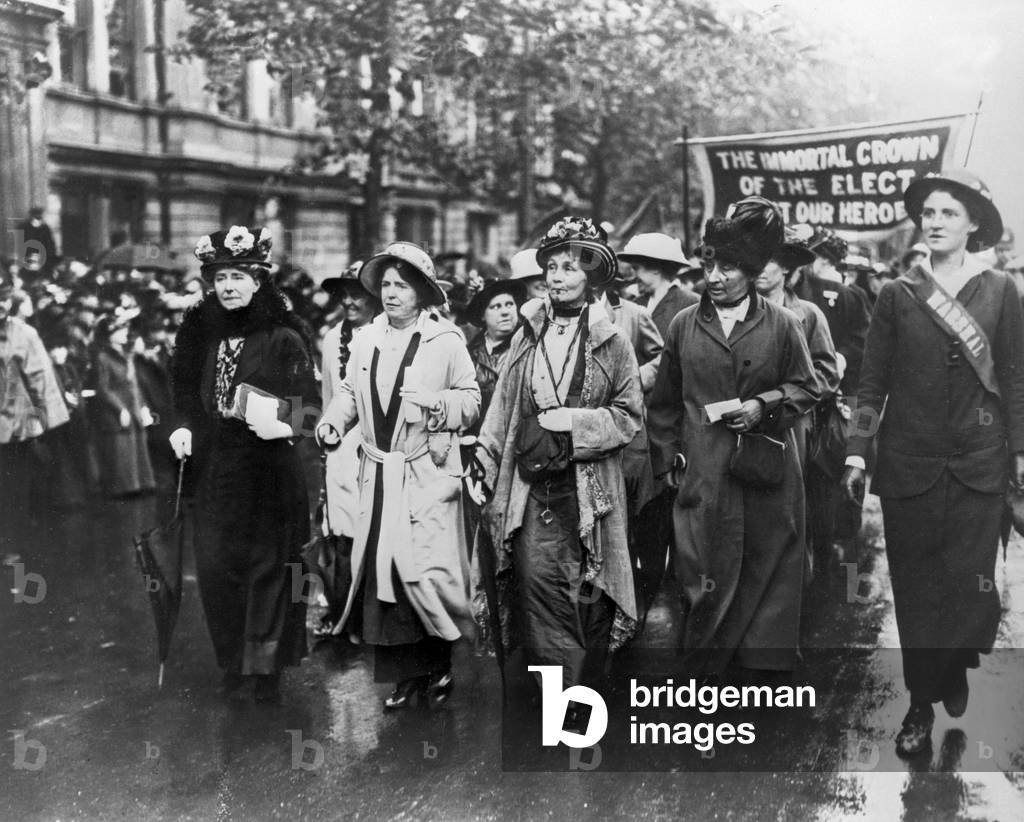 Emmeline Pankhurst and her two daughters Christabel and Sylvia at a demonstration in the streets of London, 1913 (b/w photo)