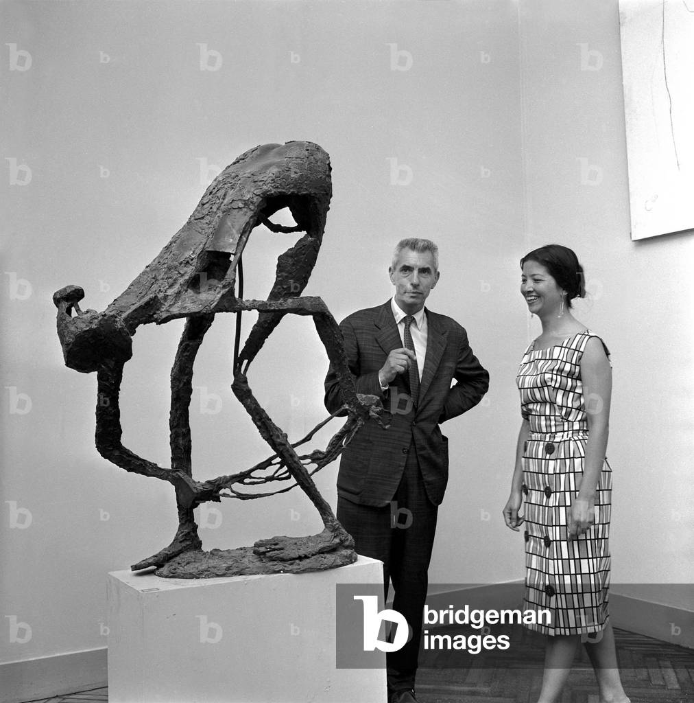 Robert Couturier with his sculpture at the Venice Biennale, 1960 (b/w photo)