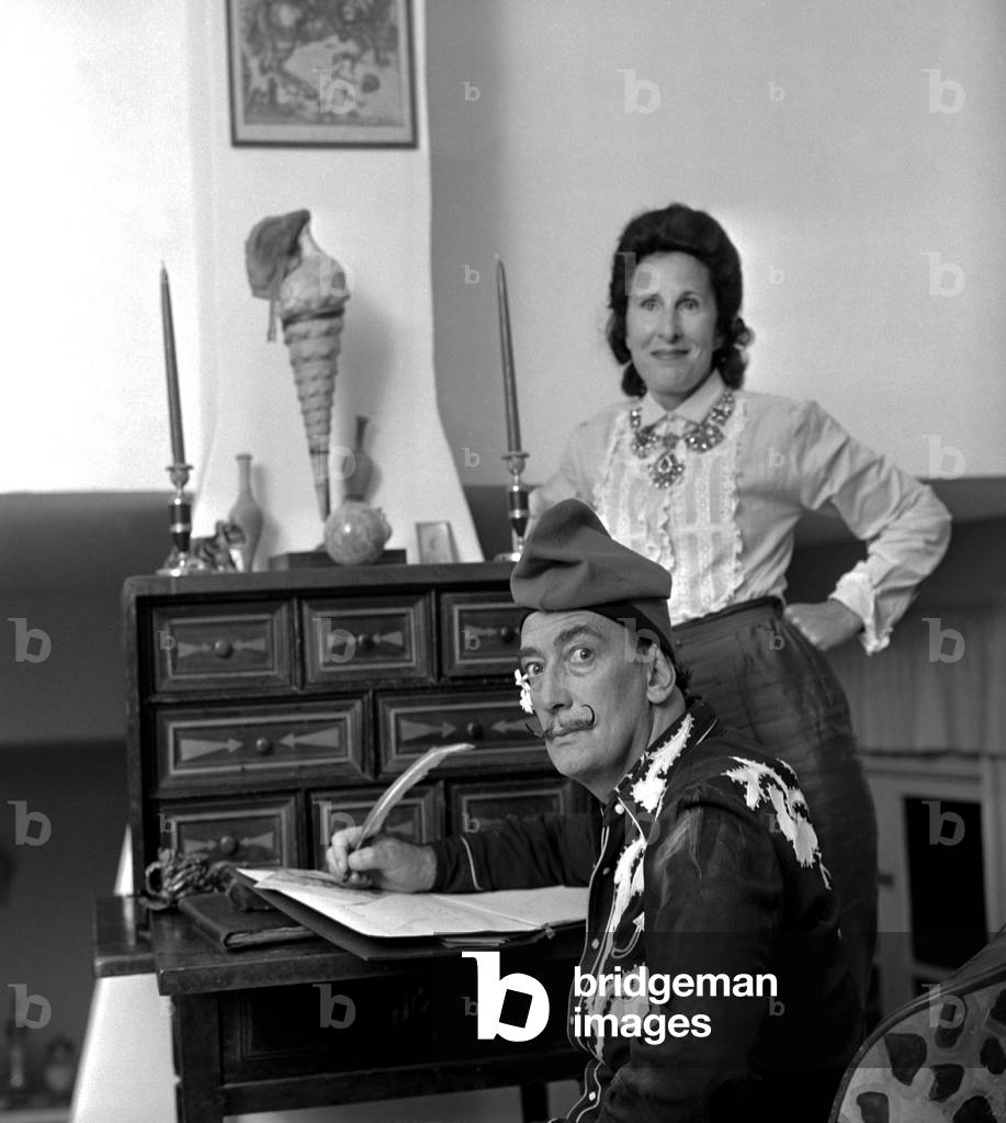Salvador Dali at home with his wife Gala, Port Lligat, Spain, 1957 (b/w photo)
