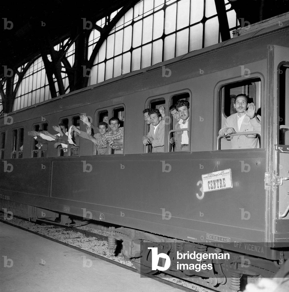 The departure of Italian emigrants for Belgium at the central station, Milan, 1955 (b/w photo)