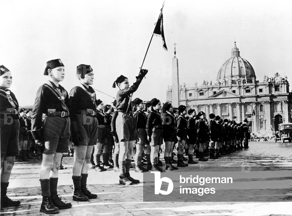 An official ceremony of the Fascist Youth (Balilla) in St Peter's Square, Rome, 1930s (b/w photo)