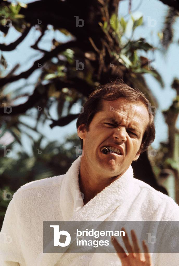 Jack Nicholson, making a face with a cigar in his mouth, 1970s (photo)