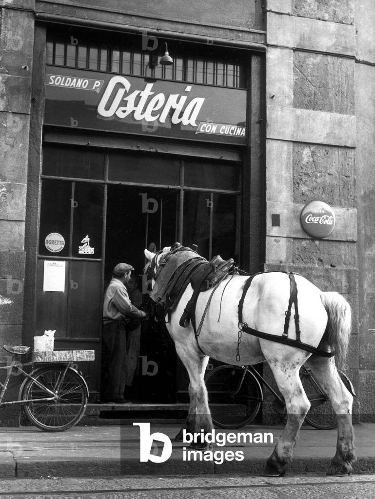 Entrance to an osteria in Ripa di Porta Ticinese, Milan, 1947 (b/w photo)