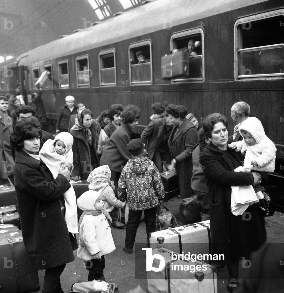 Italian emigrants passing through Milan Central Station, Milan, 1965 (b/w photo)