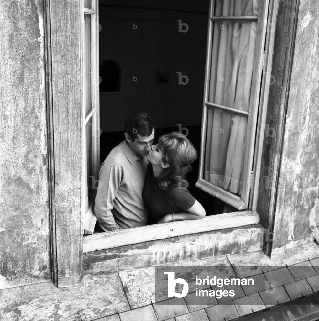 Roger Vadim with his wife Annette Stroyberg at home, Paris, 1959 (b/w photo)