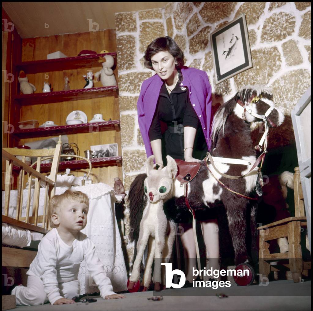 Lucia Bose at home with her son Miguel, Madrid, 1957 (photo)