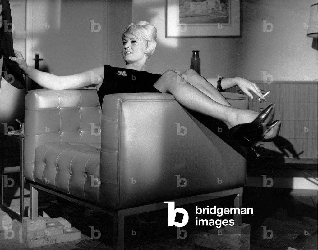 Anita Ekberg during the filming of “Call Me Bwana”,  London, England, 1962 (b/w photo)